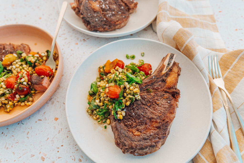 Ribeye Steak with Warm Tomato-Corn Salad and Pesto